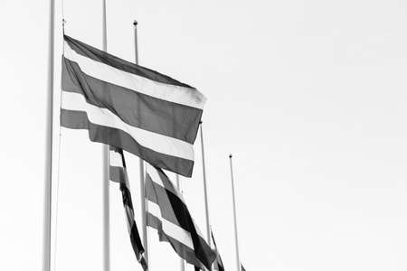 Thai flag was lowered to half-mast for paying respect for the king of Thailandの写真素材