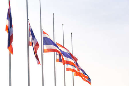 Thai flag was lowered to half-mast for paying respect for the king of Thailandの写真素材