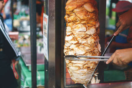 Dark chicken kebab on the stall