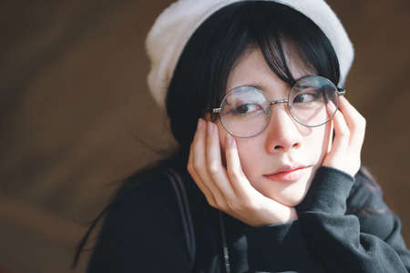 Portrait of charming Asian girl in film color styleの写真素材