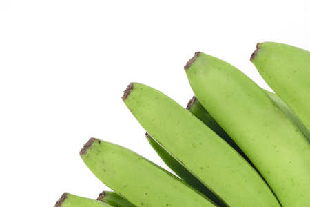 Unripe banana on white backgroundの写真素材