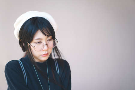 Portrait of charming Asian girl in film color styleの写真素材