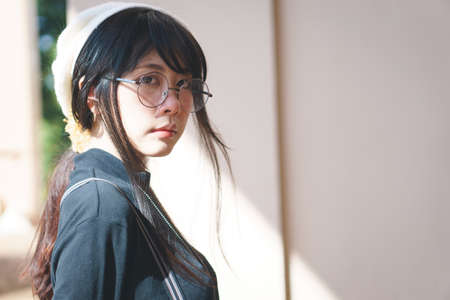 Portrait of charming Asian girl in film color styleの写真素材