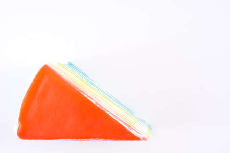 Rainbow crape cake on white backgroundの写真素材