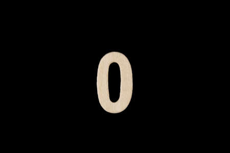 Wooden number zero on dark backgroundの写真素材