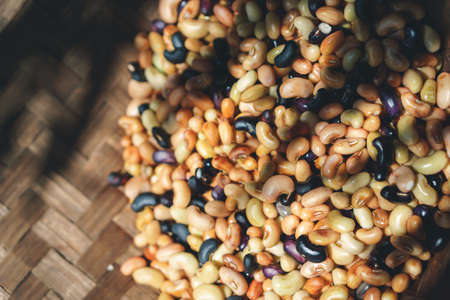 Mixed beans were washed in straw containerの写真素材
