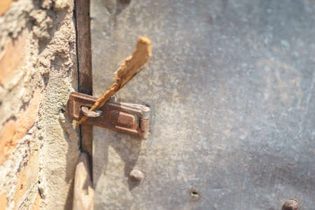 Wooden log for locking on zinc doorの写真素材