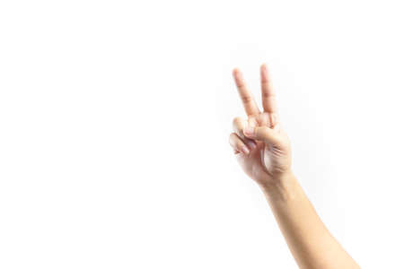 A Hand showing victory sign on white backgroundの写真素材