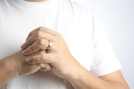 wedding ring on a man's handの写真素材