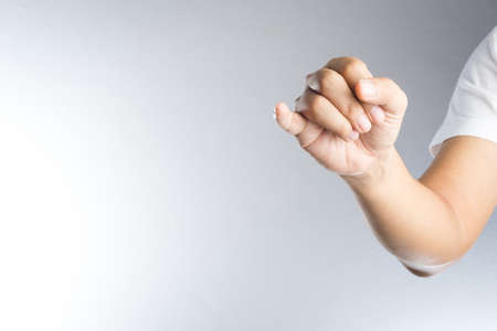 Promise hand sign, clenched a fist with little finger extendedの写真素材