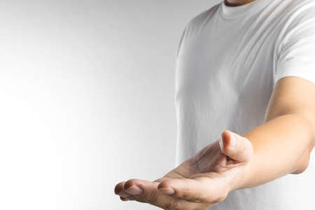 Man hand with palm up on white backgroundの写真素材