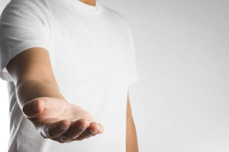 Man hand with palm up on white backgroundの写真素材