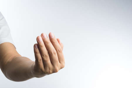 hand with invite gesture on white backgroundの写真素材