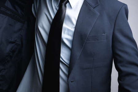Business man dressing up on white background