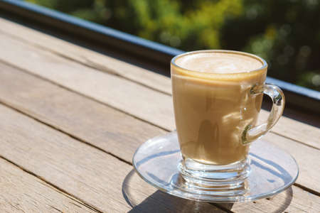 Cup of coffee with morning light