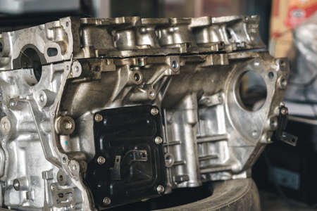 Opened old engine block interior part of car for repairingの写真素材