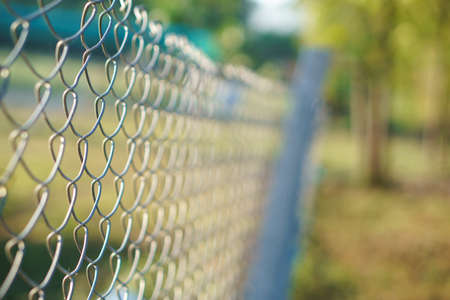 Wire steel fence in animal farm of Asian countryの写真素材