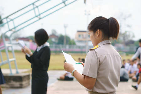 Thai teacher in official uniform on morning dutyのeditorial素材