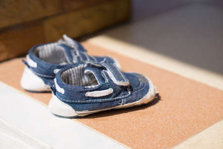 Small baby shoes dried by sunlight