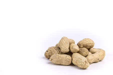 Whole peanut or groundnut shell on white background