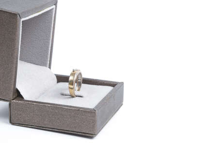 Box with ring on white background