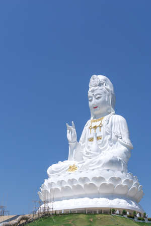 White Statue of The Guanyin, The Goddess of Compassion and Mercy in China culture locate in public temple of Northern Thailandのeditorial素材