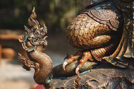 Bronze statue of Garuda of Asian culture in Thai public parkのeditorial素材
