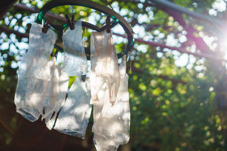Hanged plastic bag for reuseの写真素材