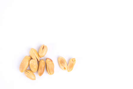 Salt roasted peanuts on white background