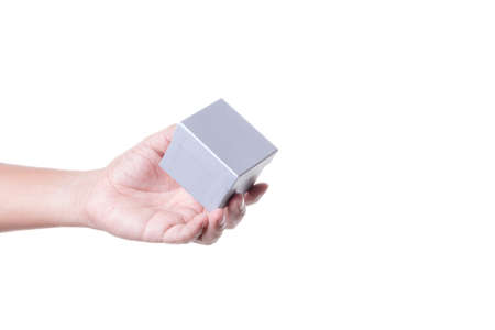 Hand holding blank luxury box as giving gift on white backgroundの写真素材