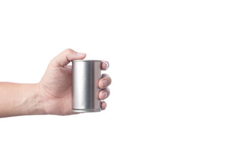 Hand holding tin or steel can made of aluminium for food on white backgroundの写真素材