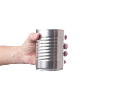 Hand holding tin or steel can made of aluminium for food on white background
