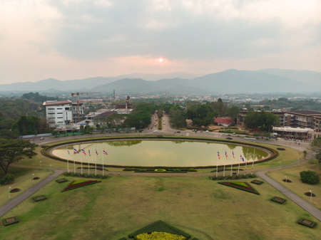 Sunset at the entrance of Mae Fah Luang, public university of Chiangrai, Thailandの写真素材