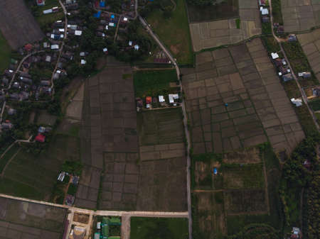 Rural village at Asian countryside with with agriculture field in Thailandのeditorial素材