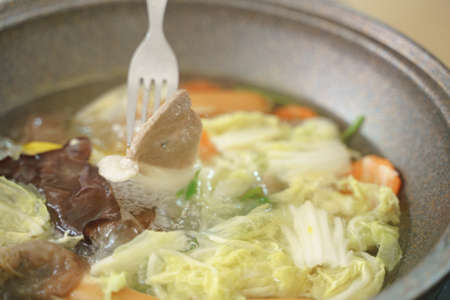 Healthy homemade hot pot, Shabu or Sukiyaki, with pork and vegetablesの写真素材