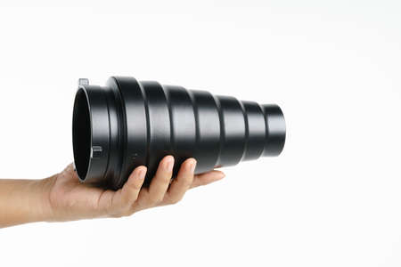 Hand holding photography studio snoot reflector for light modifierの写真素材