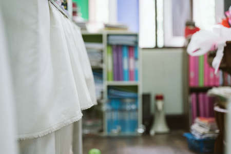 White desk curtain flowing in government office room in Thailandの写真素材