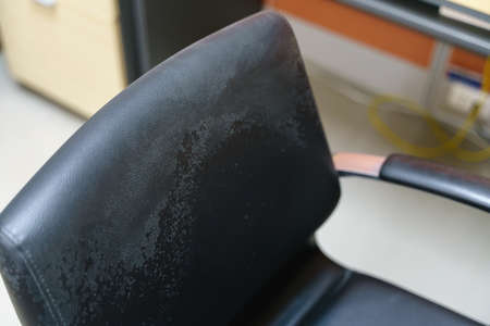Office chair with mold in backrest fabricの写真素材