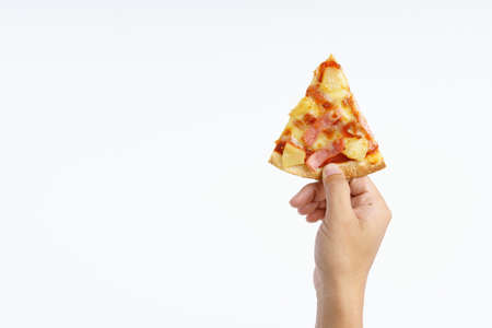 Hand holding hawaiian pizza on white background