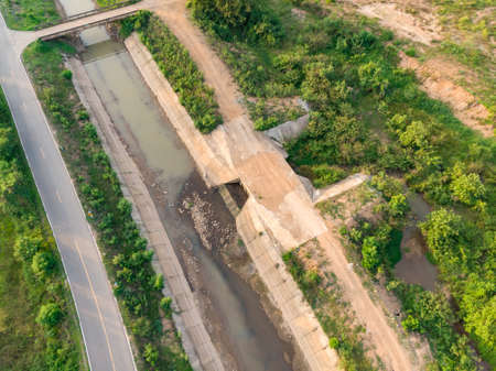 Agriculture canal with river tunnel in the evening at Asian country