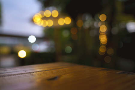 Outdoor Asian style garden with light decoration and wooden furnitureの写真素材