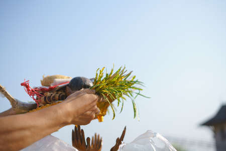 Thai traditional groundbreaking ceremony with ritual and praying along with candle and incense for...