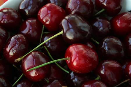 Ripe sweet cherry in a porcelain piala