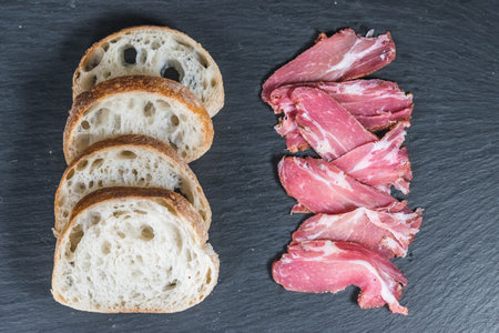 Sandwich their meat on a traditional ciabatta. Simple, farm food conceptの写真素材