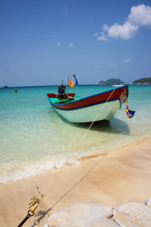 beach with boat on Ko Tao island,thailandの写真素材