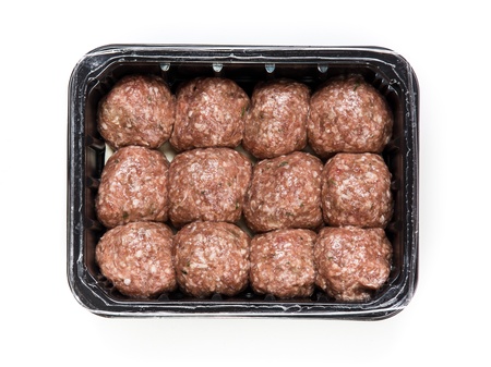 Flesh meat product for cooking packed in box isolated on whiteの写真素材