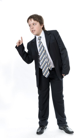 Office style dressed young boy isolated on whiteの写真素材