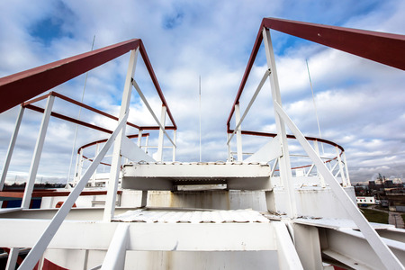 Tall staircase to big oil tank in refineryの写真素材