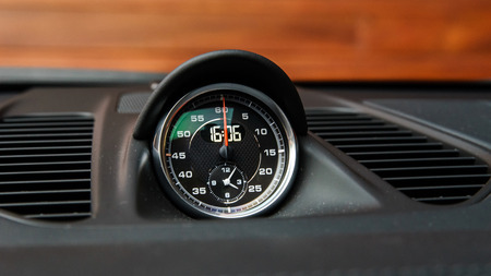 Luxury car interior details. Skin and chromium.
