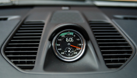 Luxury car interior details. Skin and chromium.